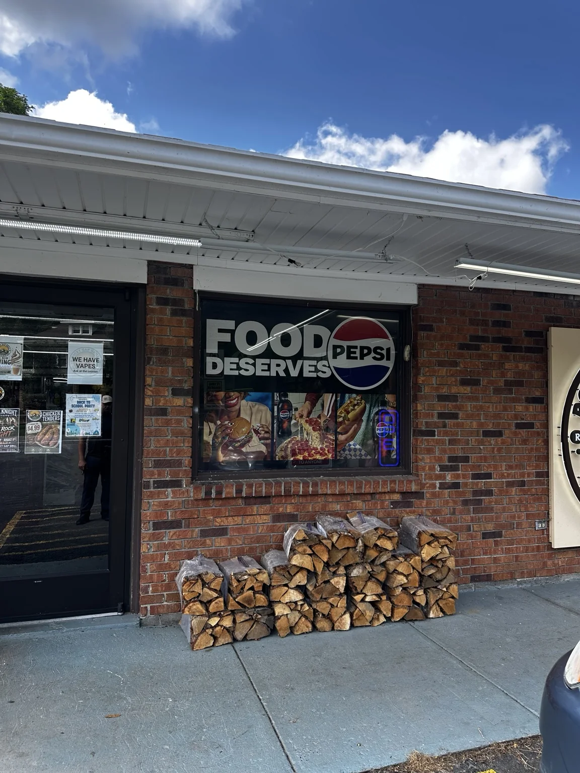 Rocky Gap Grill storefront and firewood